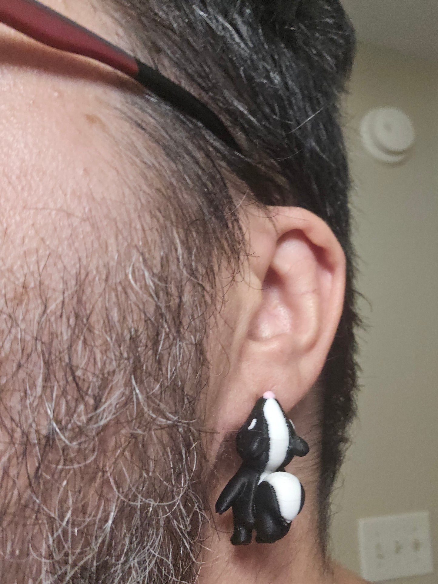Hungry skunk earrings